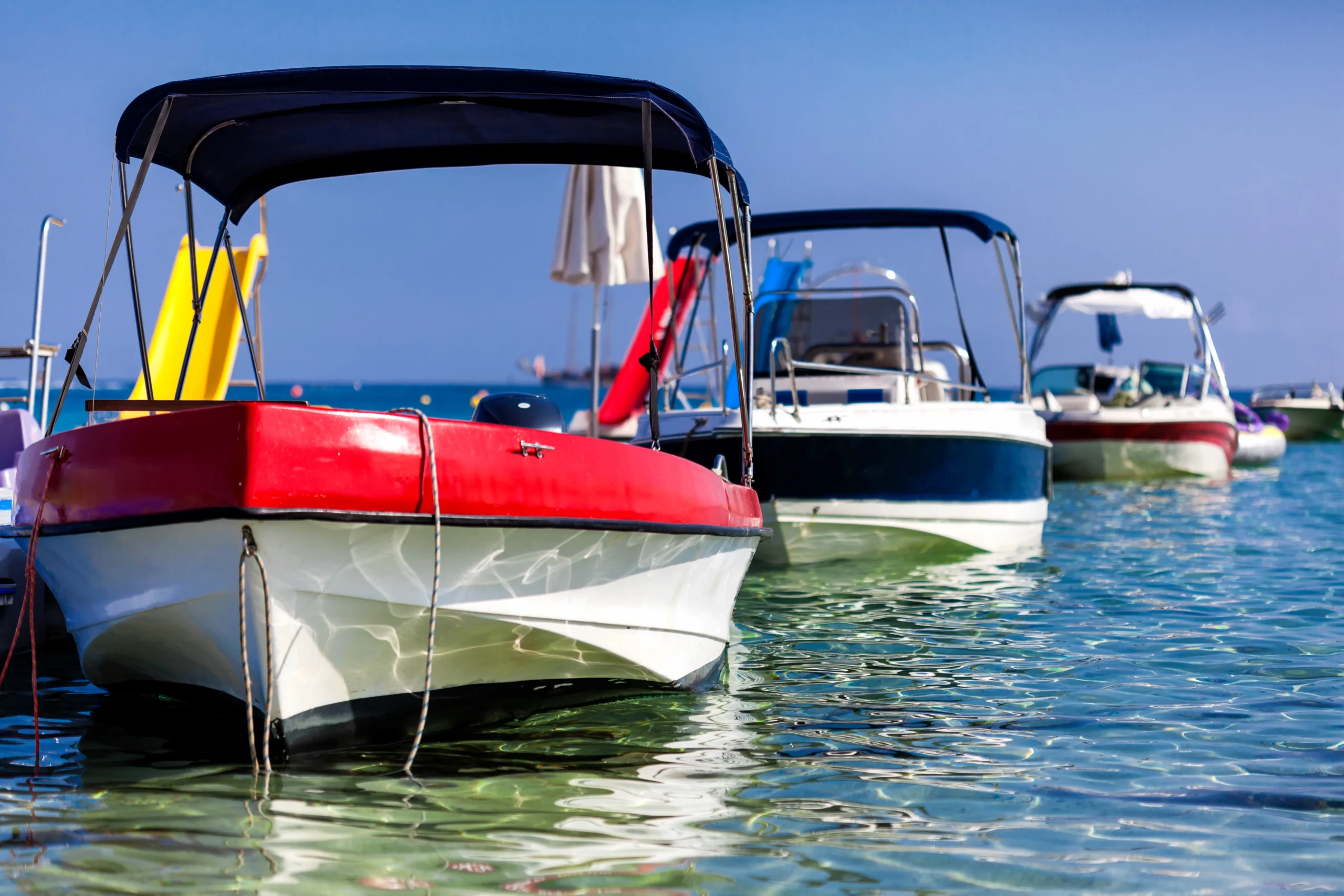 Motor boats at the pier in the sea